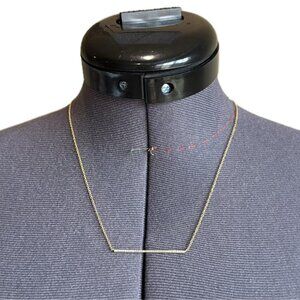 Gold necklace with diamond bar